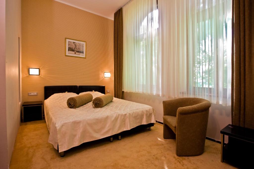 Voodi või voodid majutusasutuse Depandans Jezero toas