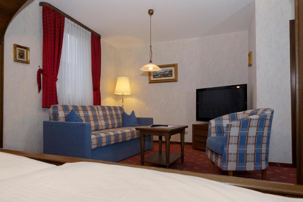 TV a/nebo společenská místnost v ubytování Hotel Gondel