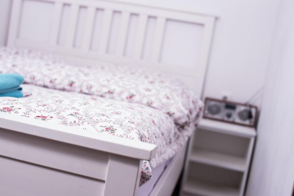 Postel nebo postele na pokoji v ubytování Mirror Apartments