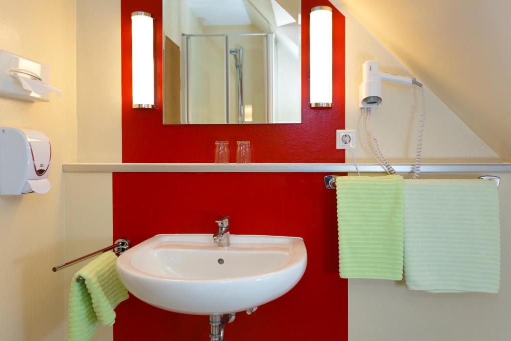 Koupelna v ubytování Hotel Gondel