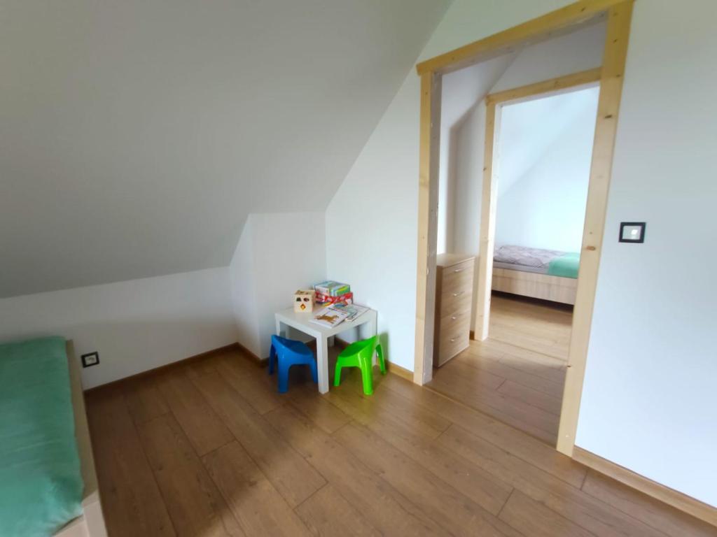 Posteľ alebo postele v izbe v ubytovaní Happy Holiday domki Zator