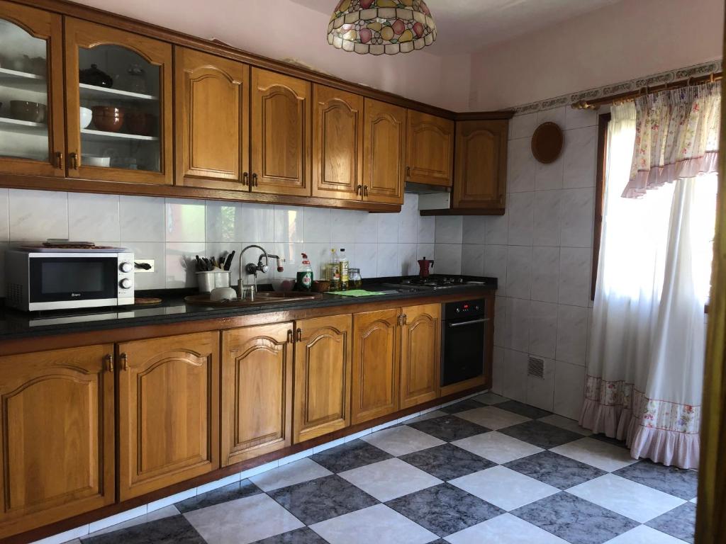 Kuchyň nebo kuchyňský kout v ubytování Aguere Nest Hostel