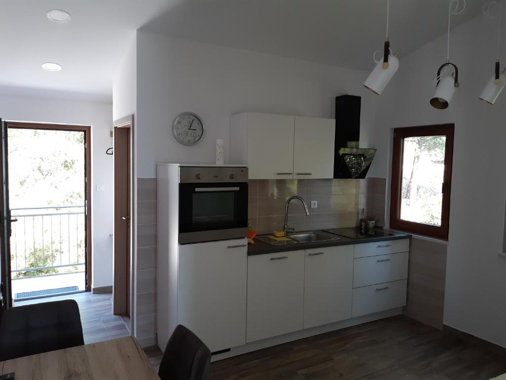Kuchyňa alebo kuchynka v ubytovaní Sea view Apartment