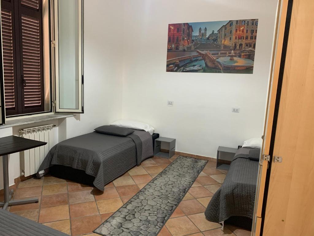 Postel nebo postele na pokoji v ubytování Zidan Guest House
