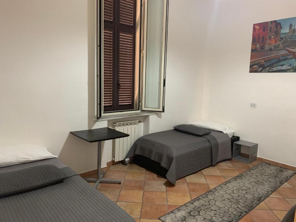 Postel nebo postele na pokoji v ubytování Zidan Guest House