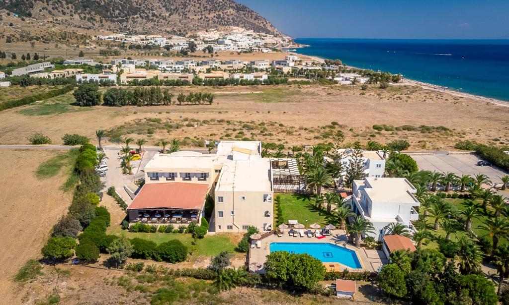 an aerial view of the house and the beach at Kalimera Mare in Kardamaina