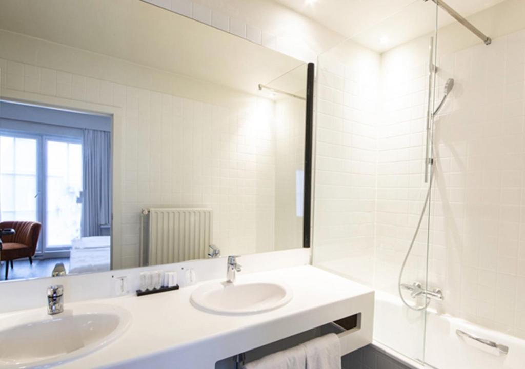 Koupelna v ubytování Hotel Cortina