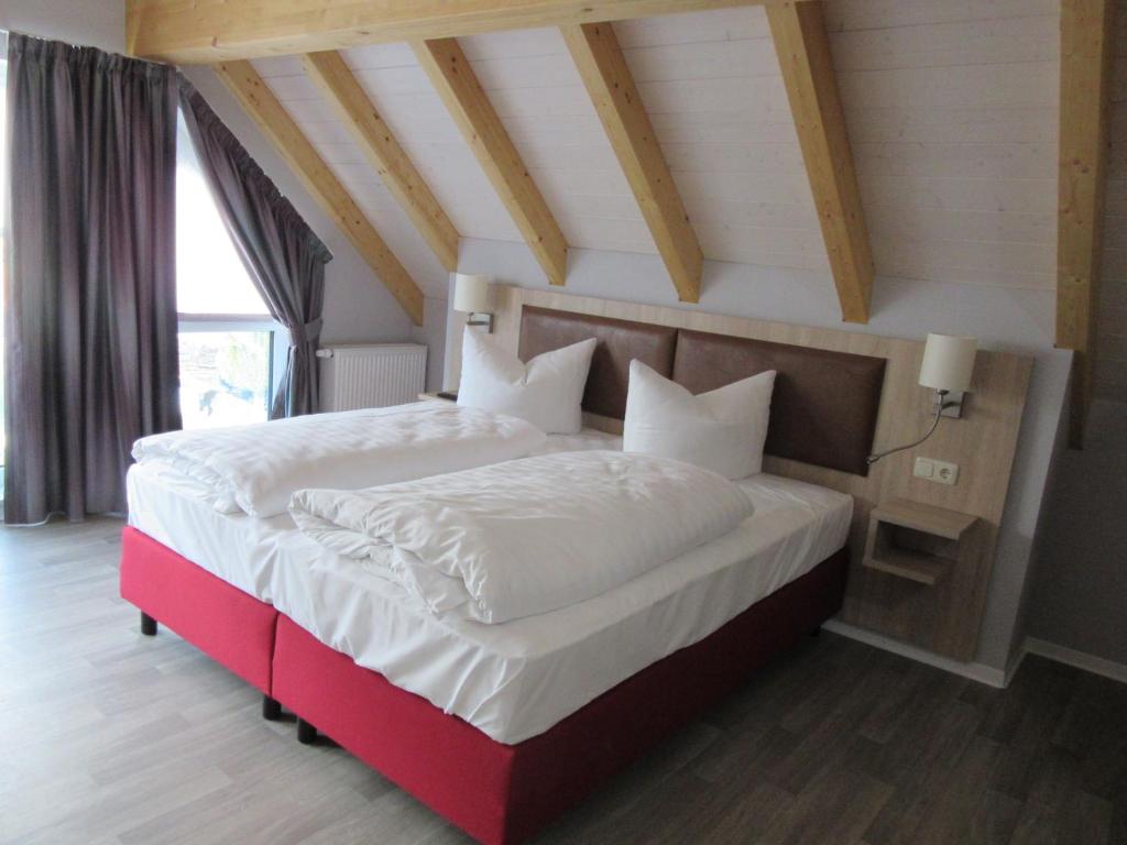 Katil atau katil-katil dalam bilik di Hotel-Gasthaus Steiger