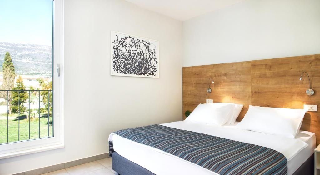 Katil atau katil-katil dalam bilik di Hotel Štacija