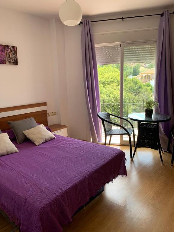 Posteľ alebo postele v izbe v ubytovaní Apartamento en Cuevas del Becerro