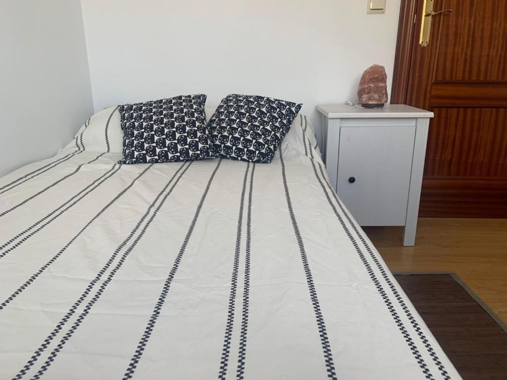 Posteľ alebo postele v izbe v ubytovaní Apartamento en Cuevas del Becerro