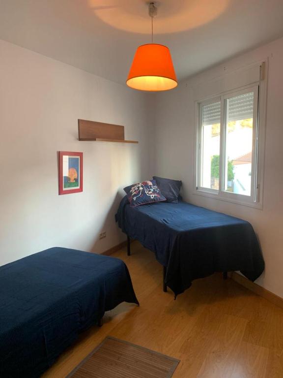 Posteľ alebo postele v izbe v ubytovaní Apartamento en Cuevas del Becerro