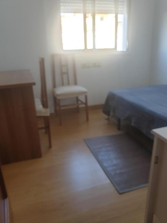 Posteľ alebo postele v izbe v ubytovaní Apartamento en Cuevas del Becerro