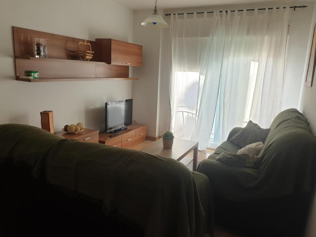Posedenie v ubytovaní Apartamento en Cuevas del Becerro