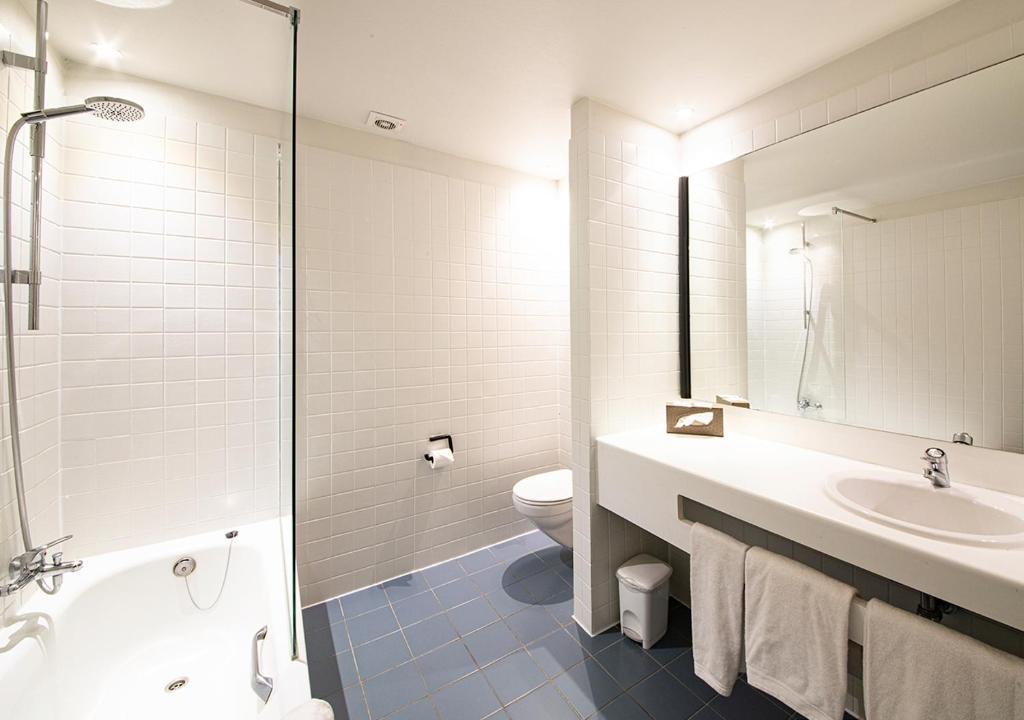 Koupelna v ubytování Hotel Cortina