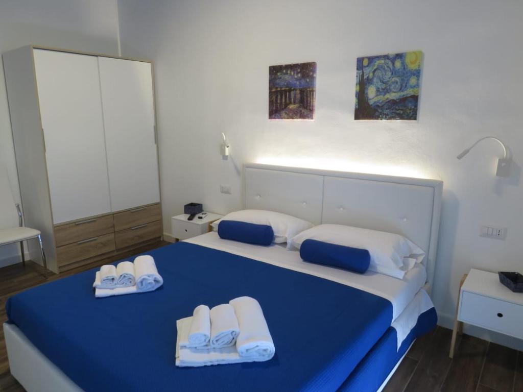 Postel nebo postele na pokoji v ubytování B&b Angolo 29