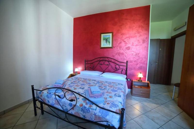 A bed or beds in a room at Maxpensione