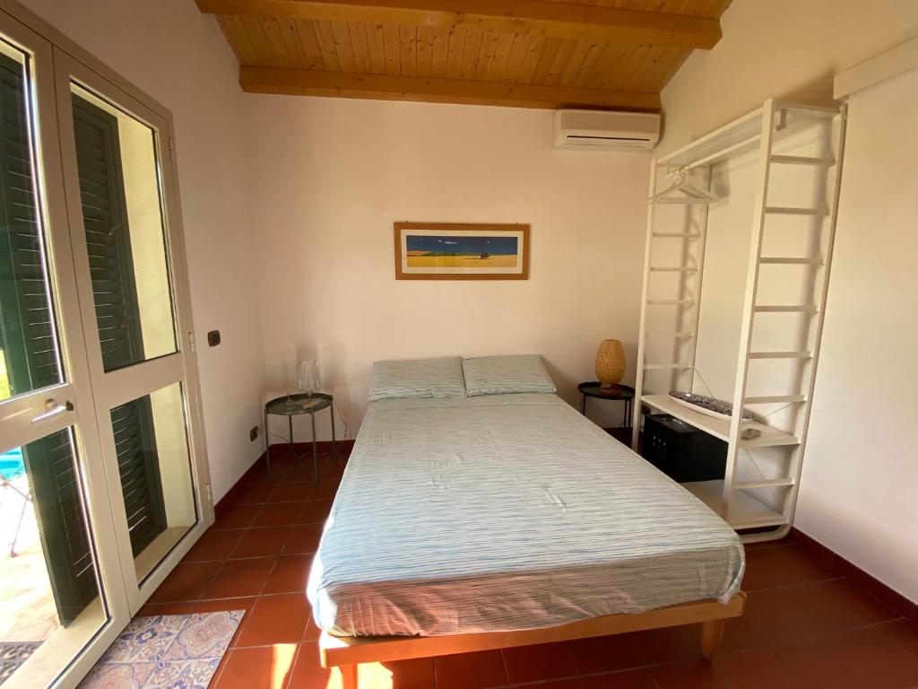 Postel nebo postele na pokoji v ubytování Karrua House - Magnolia Room