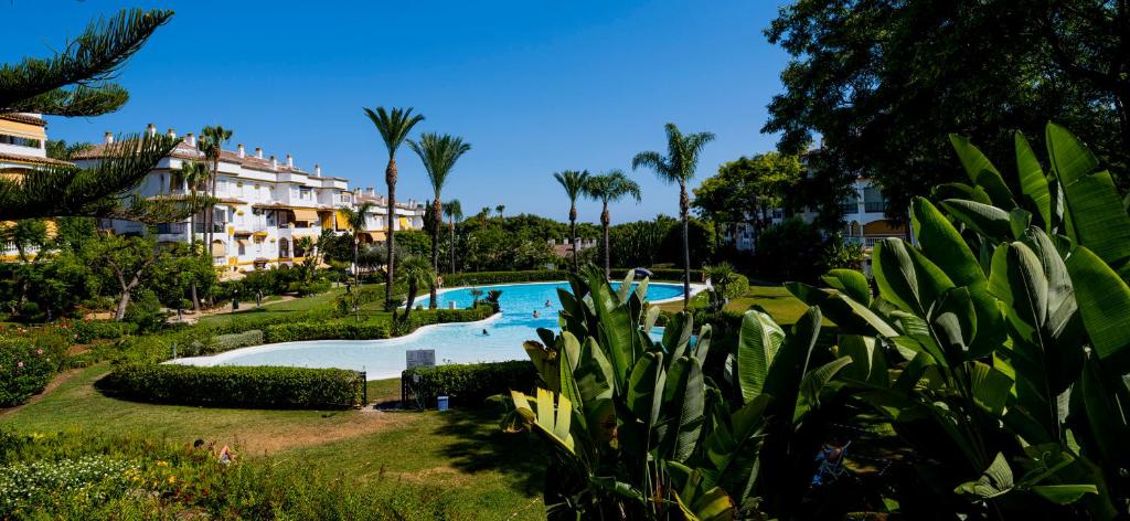 Bazén v ubytování APARTAMENTO MILLA DE ORO- HACIENDA NAGUELES 4D nebo v jeho okolí
