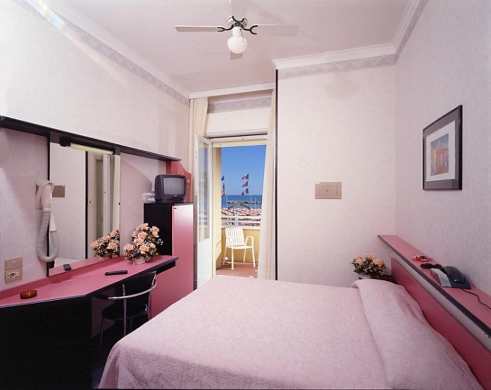 Postel nebo postele na pokoji v ubytování Hotel Ida