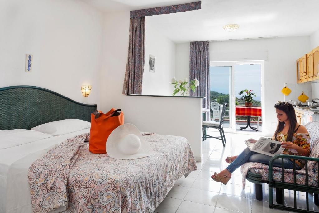 Letto o letti in una camera di Parco Residence La Rosa