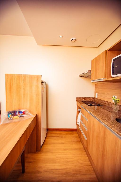 A cozinha ou cozinha compacta de Blue Tree Towers Millenium Porto Alegre