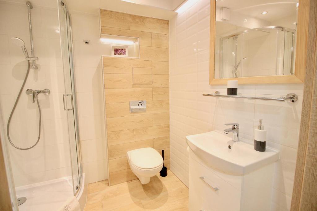 Kúpeľňa v ubytovaní Apartment BazaTatry Parkowy