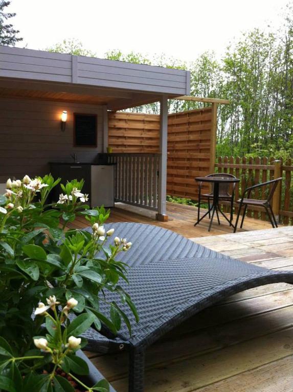 Patio nebo venkovní prostory v ubytování Bulle d'R