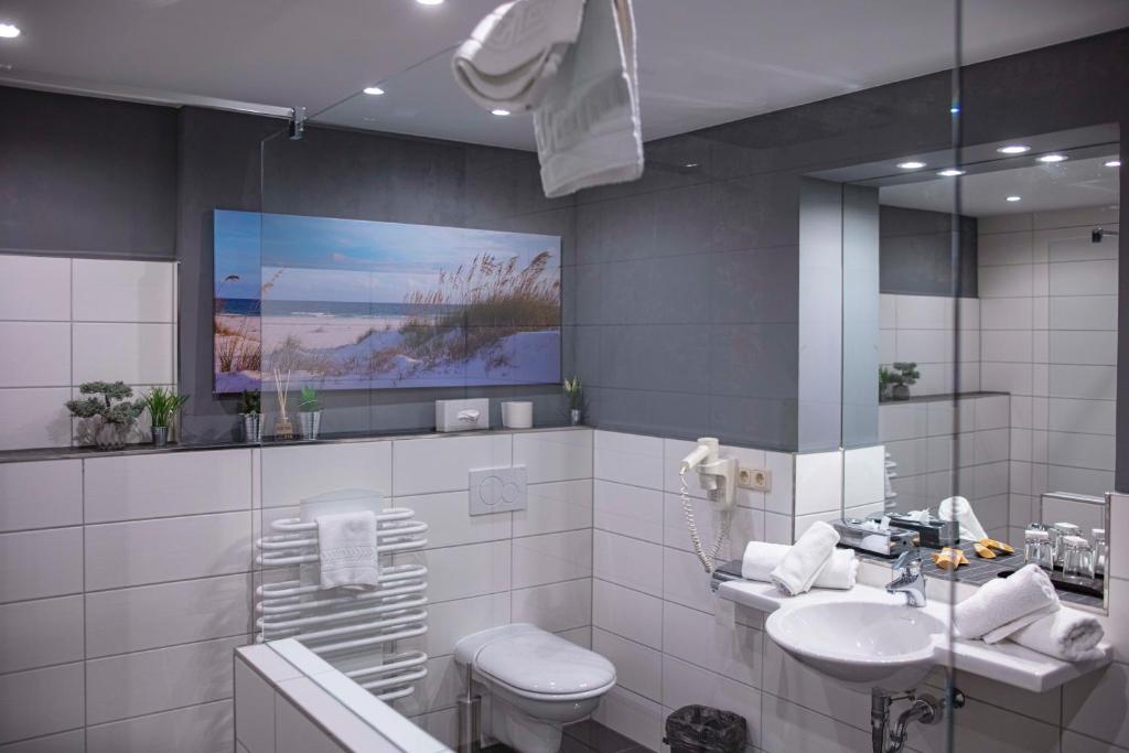 Koupelna v ubytování SL'otel im Parforcehaus