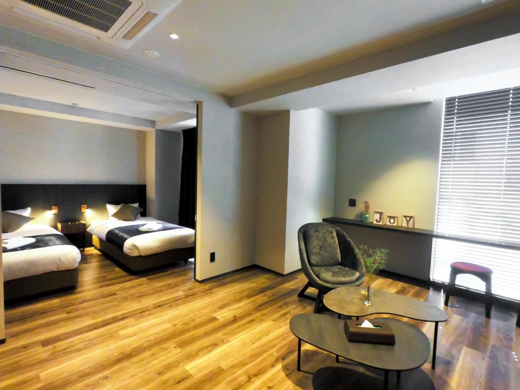 Postel nebo postele na pokoji v ubytování Hotel S-Presso South