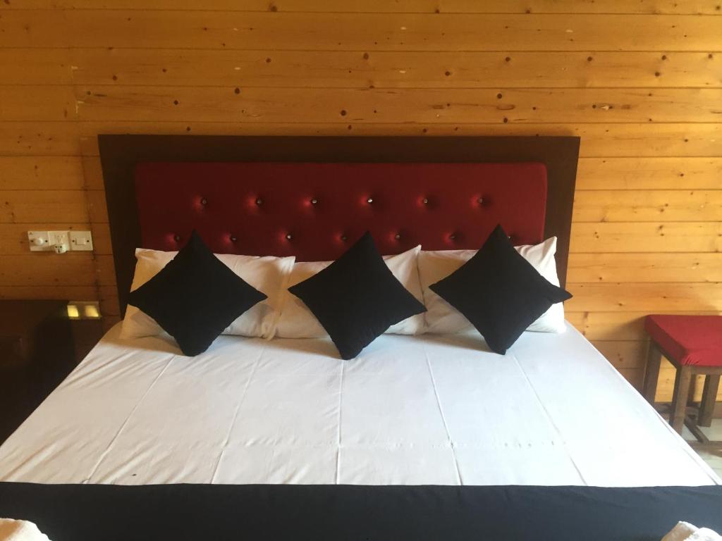 Postel nebo postele na pokoji v ubytování Elvis Beach Resort