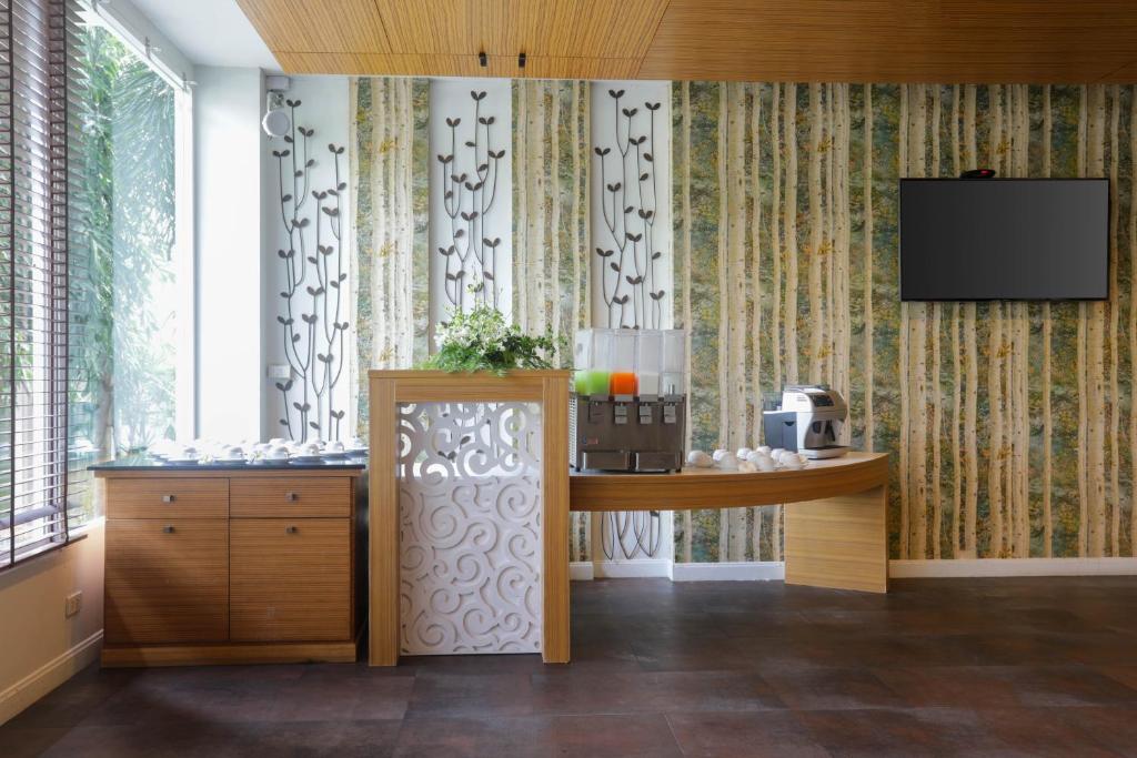 Kuchyň nebo kuchyňský kout v ubytování A2 Pool Resort - SHA Plus