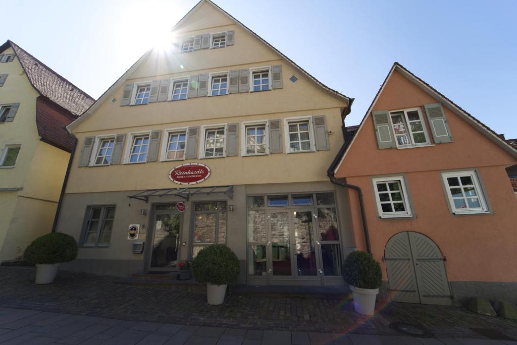 a building with a store in front of it at Hotel Reinhardts in Bietigheim-Bissingen