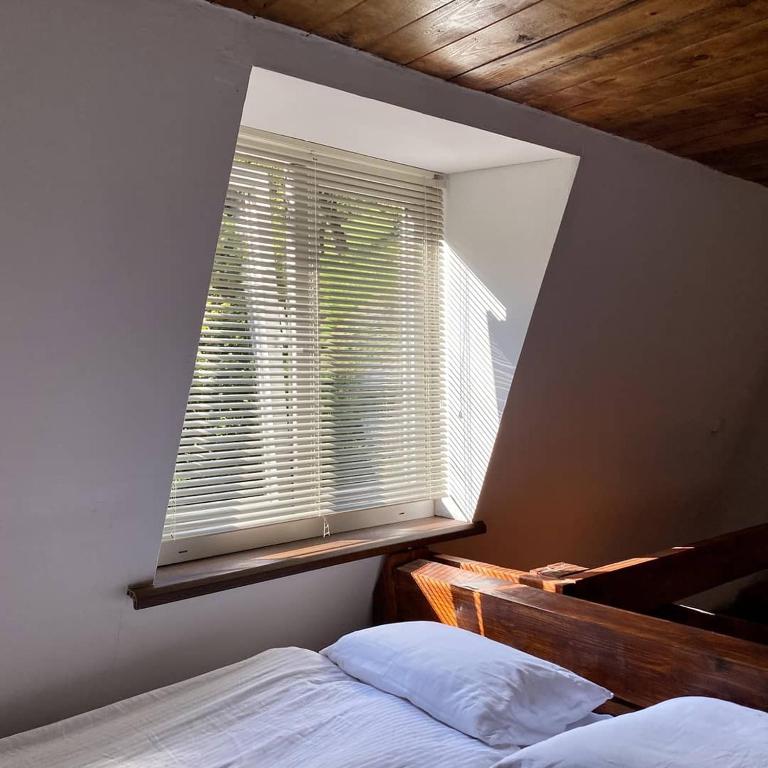 Postel nebo postele na pokoji v ubytování Salo I Mandry Apartment