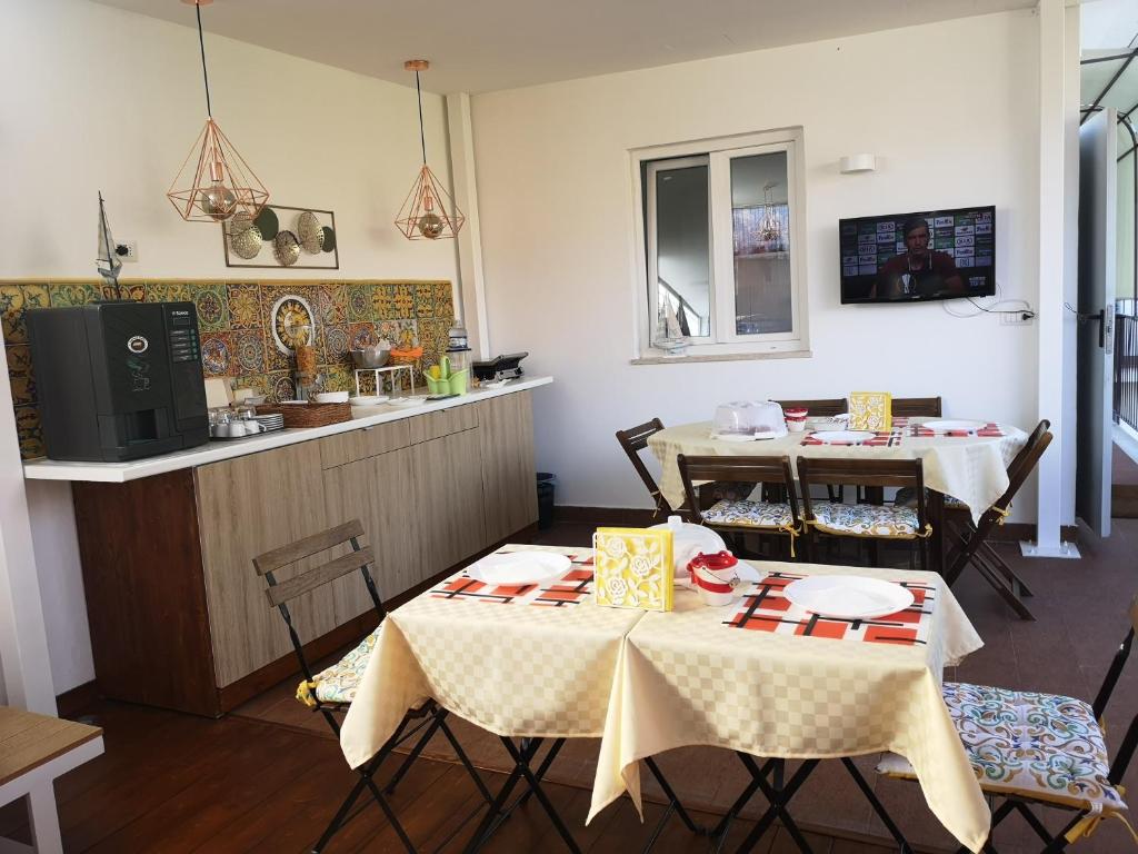 TV a/nebo společenská místnost v ubytování Tortugas B&B