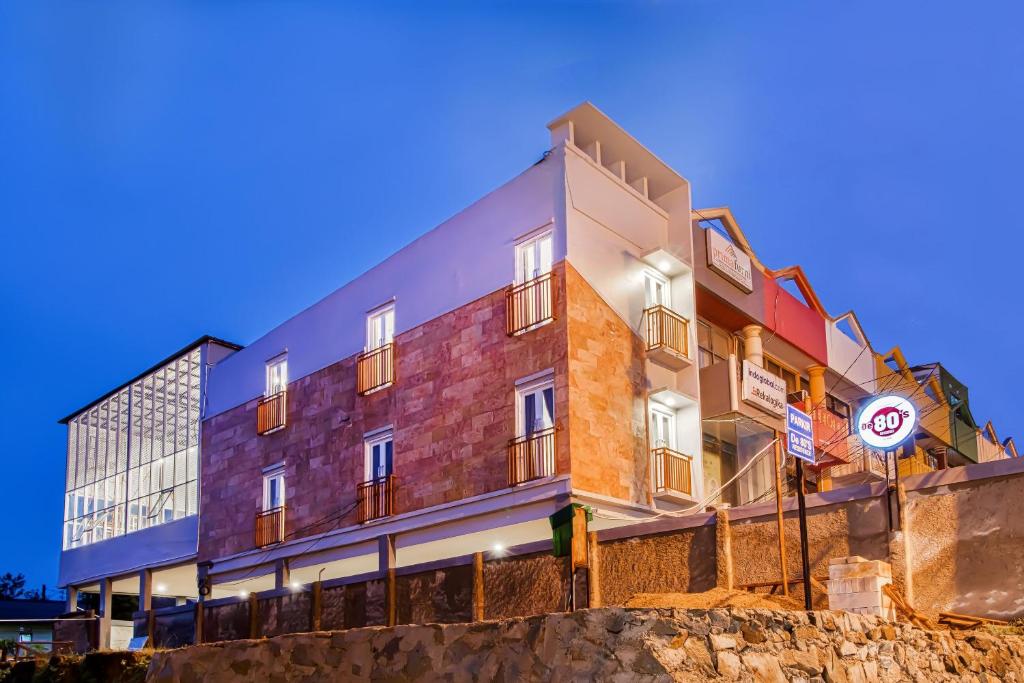 a building on the side of a cliff at Urban24 Syariah Depok in Depok