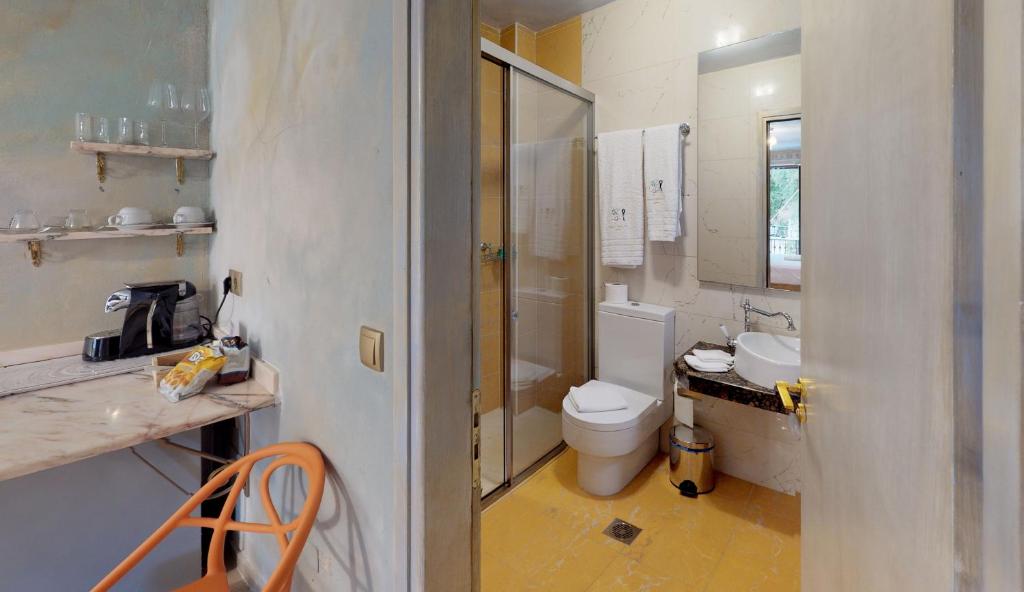Koupelna v ubytování Leda Suites