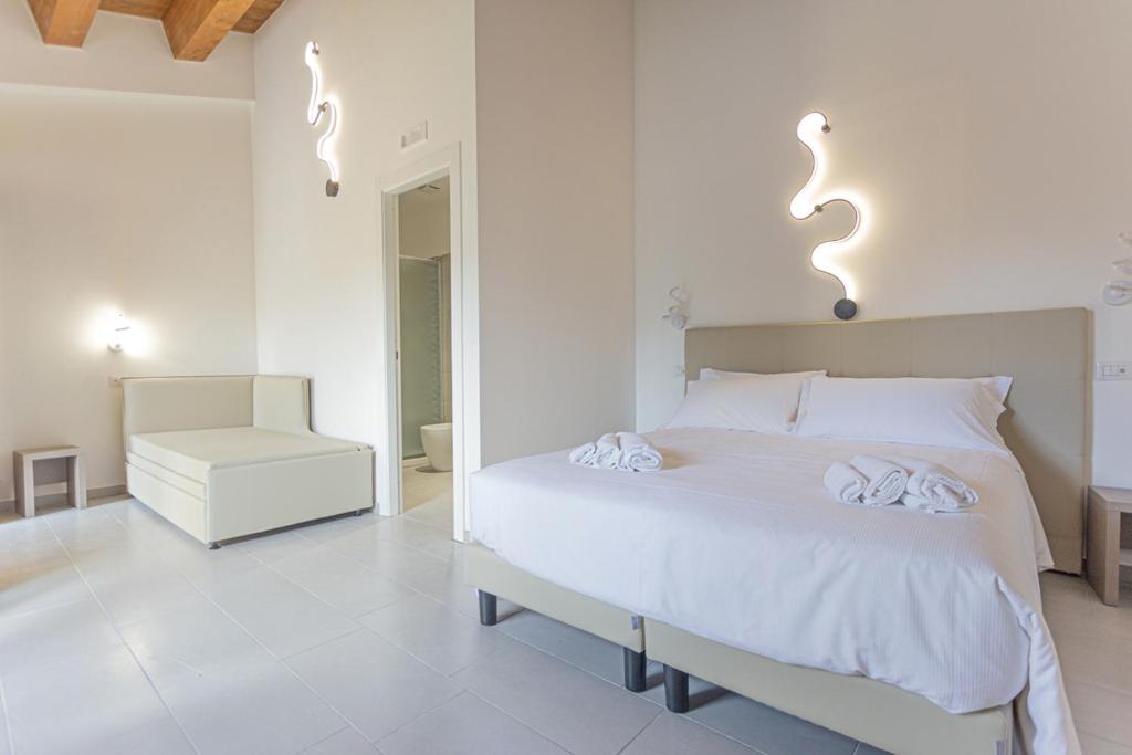 Postel nebo postele na pokoji v ubytování Albergo Diffuso Amatrice