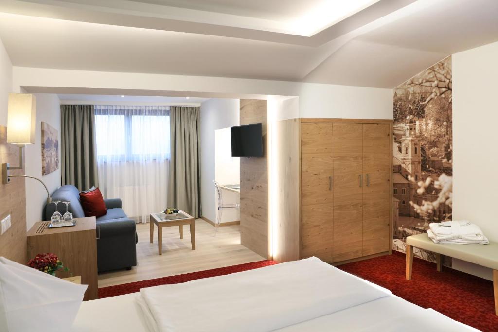 Postel nebo postele na pokoji v ubytování Hotel Hubertushof