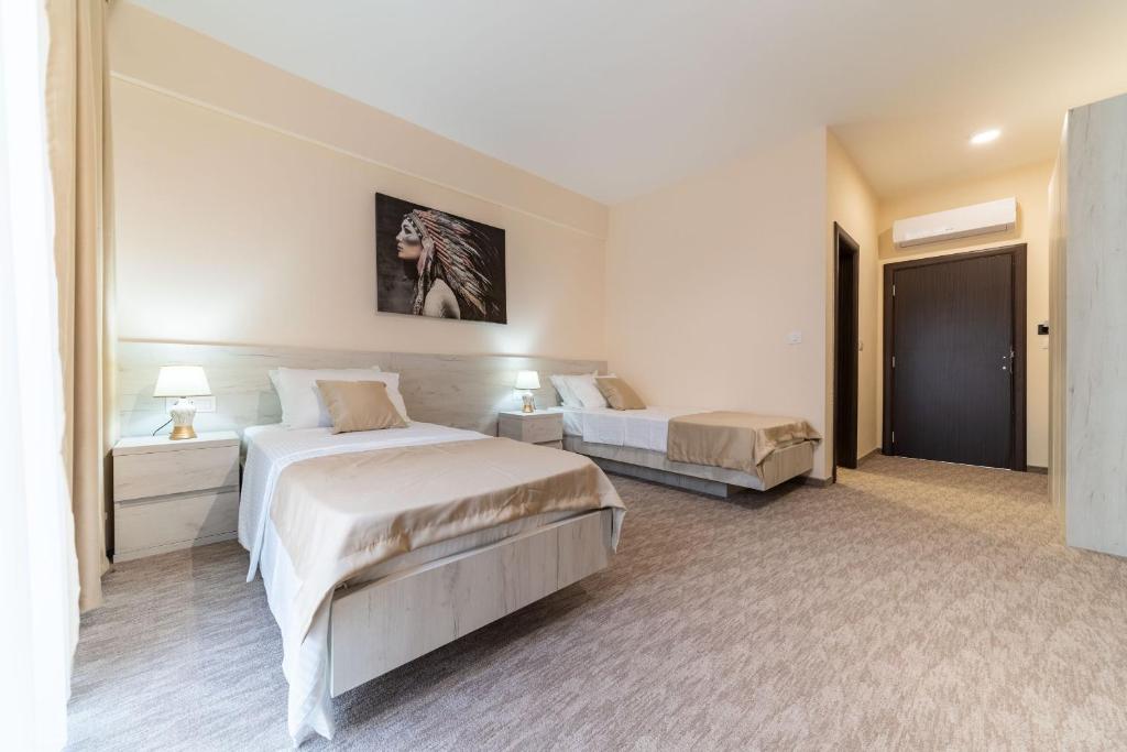 Postel nebo postele na pokoji v ubytování Hotel RIO VERDE