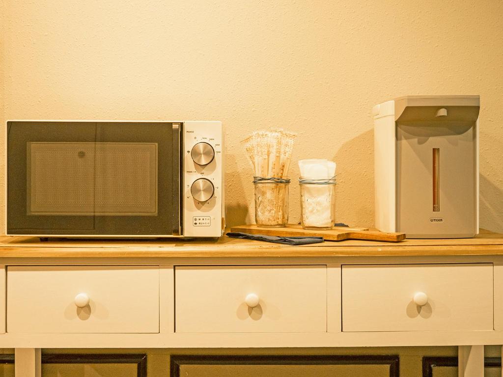 Kuchyň nebo kuchyňský kout v ubytování Hotel Areaone Tokai