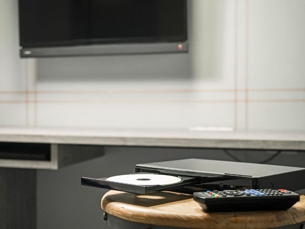 TV a/nebo společenská místnost v ubytování Hotel Areaone Tokai