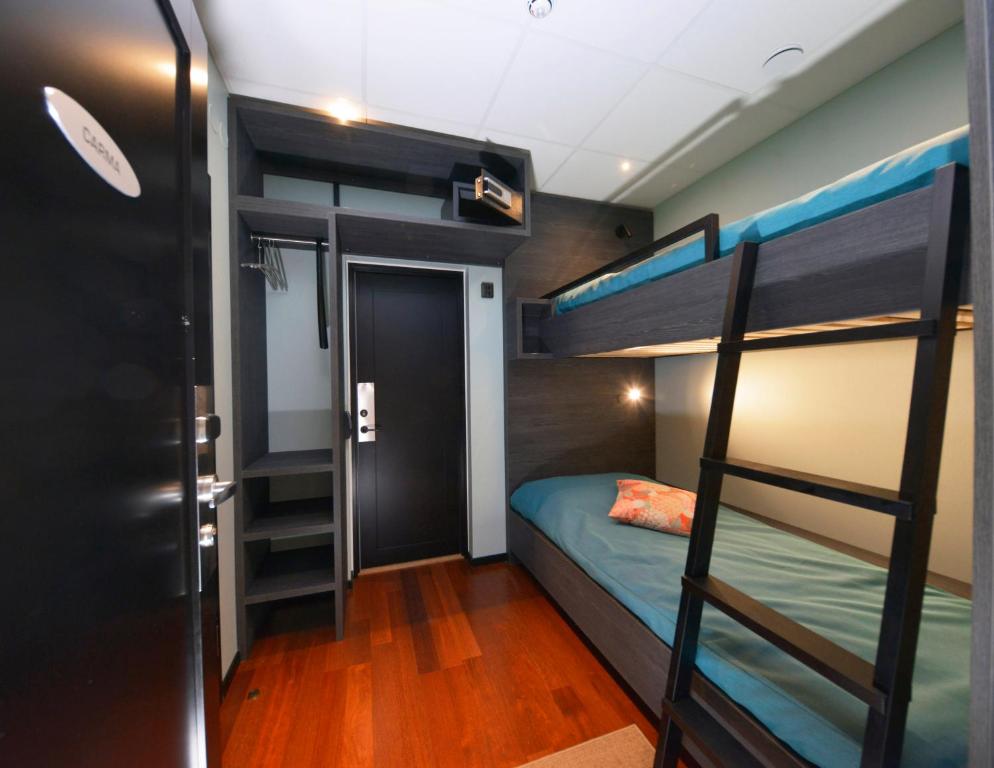 Postel nebo postele na pokoji v ubytování Staykvick Boutique Hostel