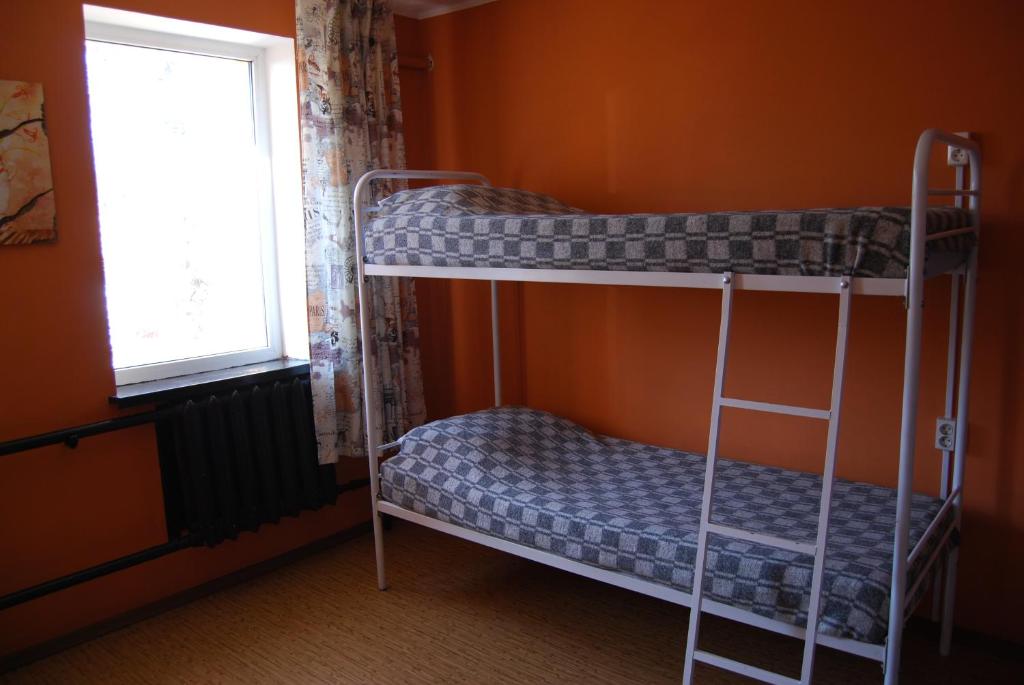 Postel nebo postele na pokoji v ubytování Sweetdream Hostel