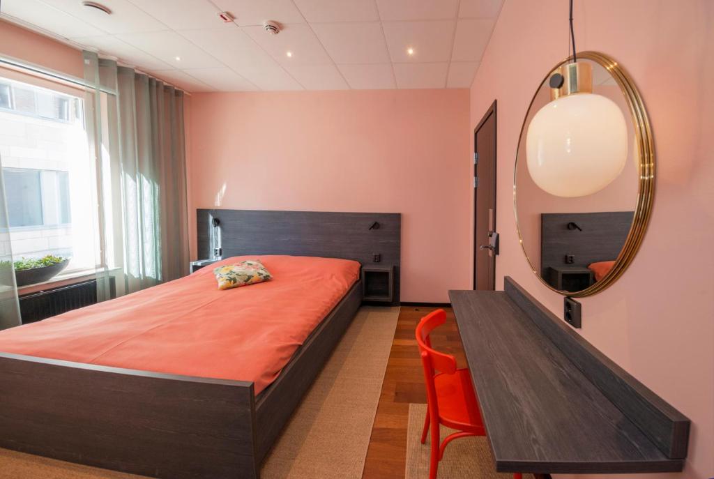 Postel nebo postele na pokoji v ubytování Staykvick Boutique Hostel