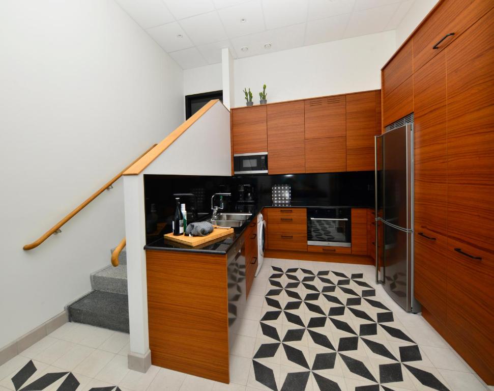Kuchyň nebo kuchyňský kout v ubytování Staykvick Boutique Hostel
