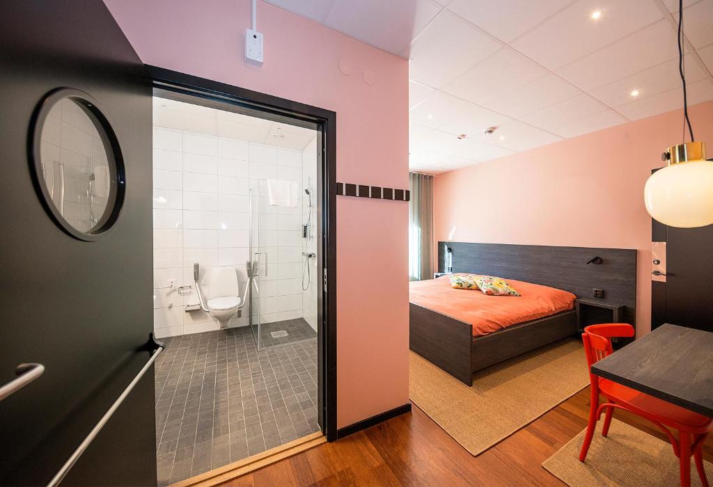 Postel nebo postele na pokoji v ubytování Staykvick Boutique Hostel