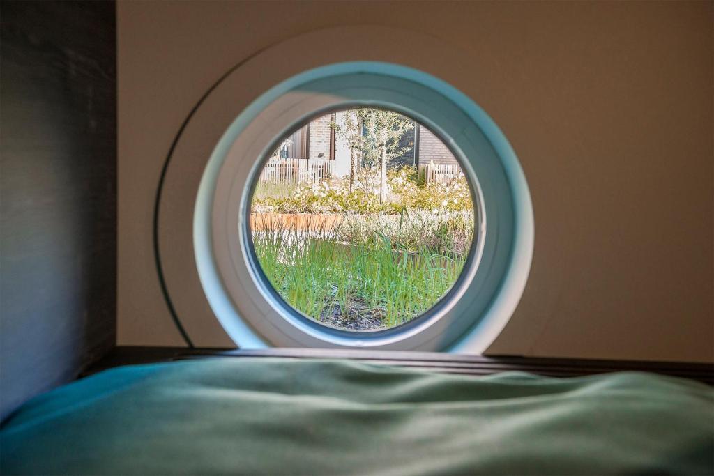 Postel nebo postele na pokoji v ubytování Staykvick Boutique Hostel