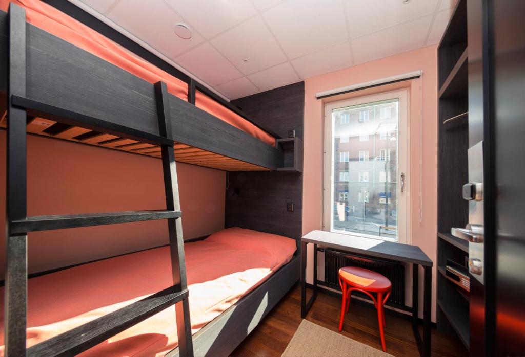 Postel nebo postele na pokoji v ubytování Staykvick Boutique Hostel