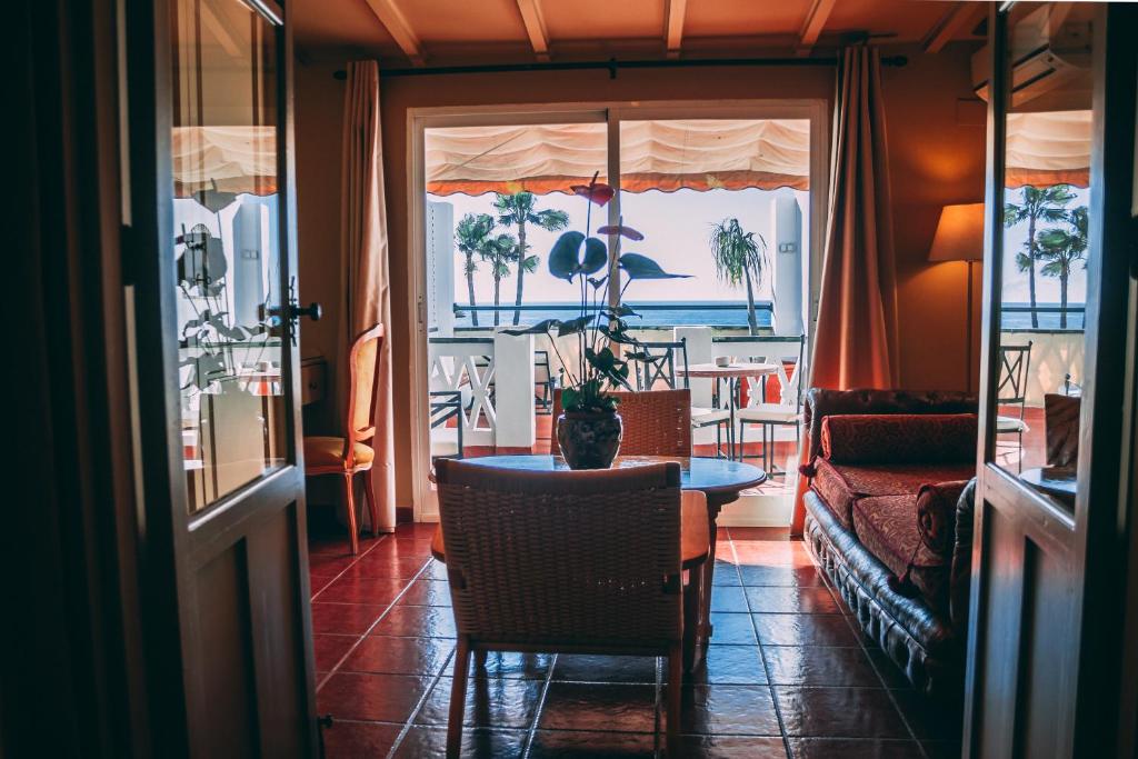Posezení v ubytování Hotel Carabeo